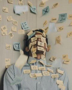 young man covered in sticky notes