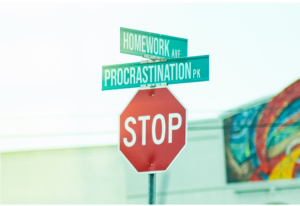 stop procrastinating; a stop sign with a procrastination sign above it