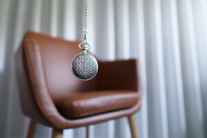 hypnotherapy for relationships; a locket and a chair