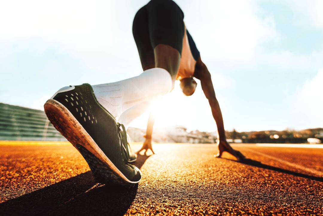 sports performance, a runner in ready position