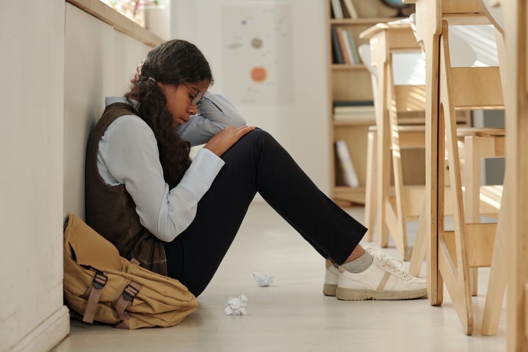 communication style, a woman sitting on the floor 