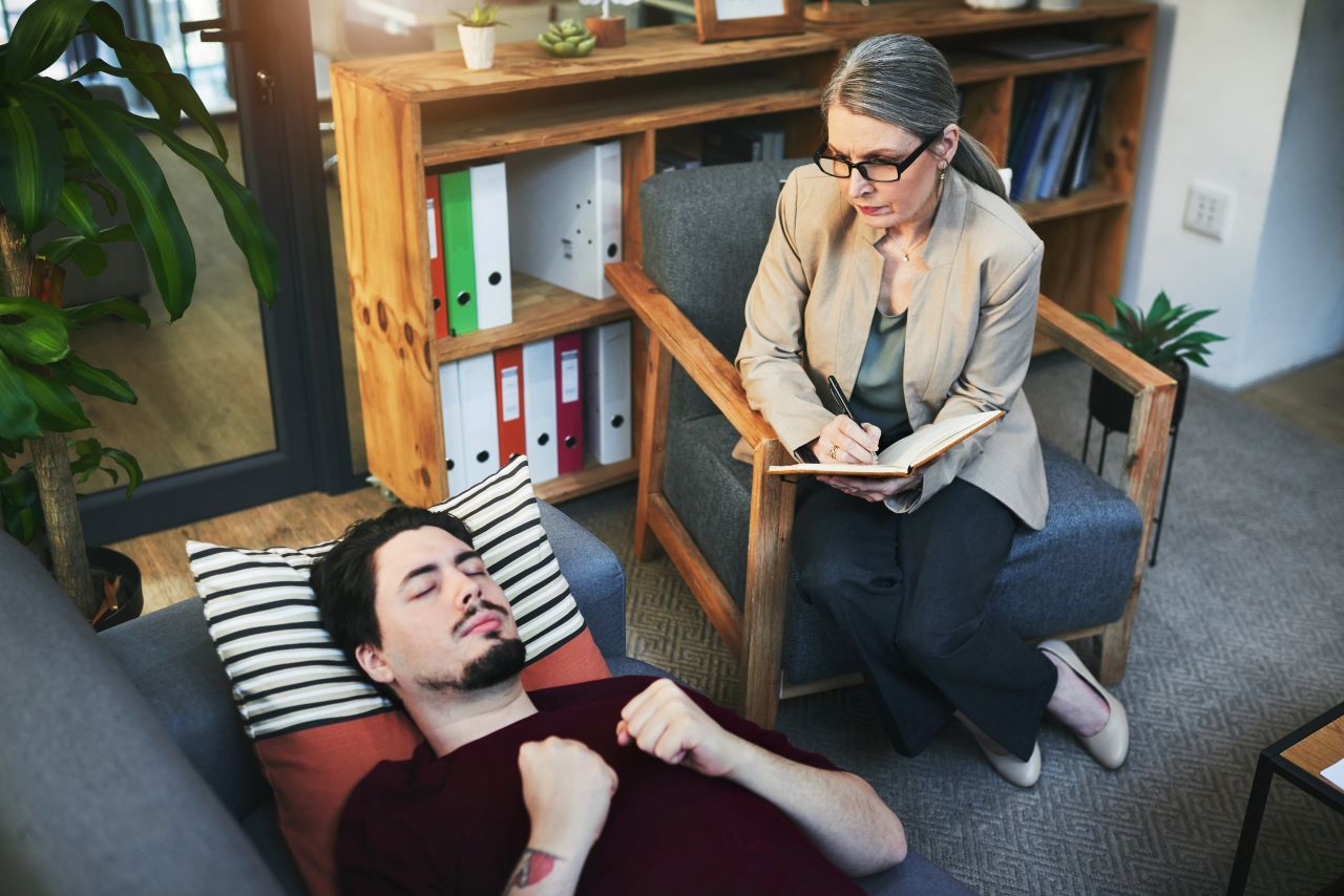 how to get rid of anger management issues, a patient laying on a sofa with closed eyes